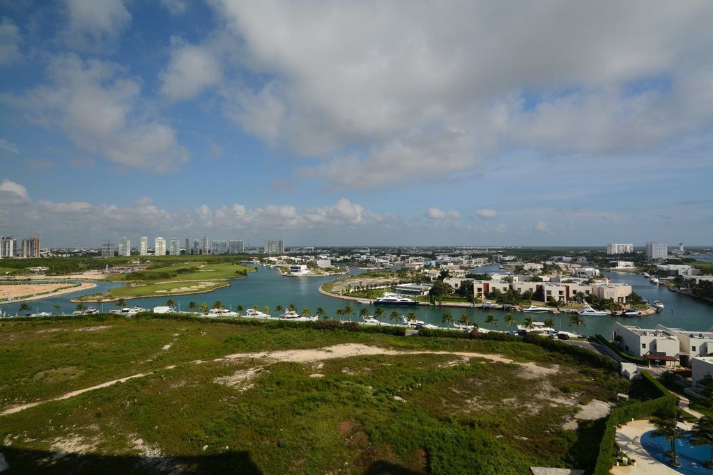 Novo Cancún — 4-Bed Luxury Condo · Ocean & Lagoon Views · Puerto Cancún