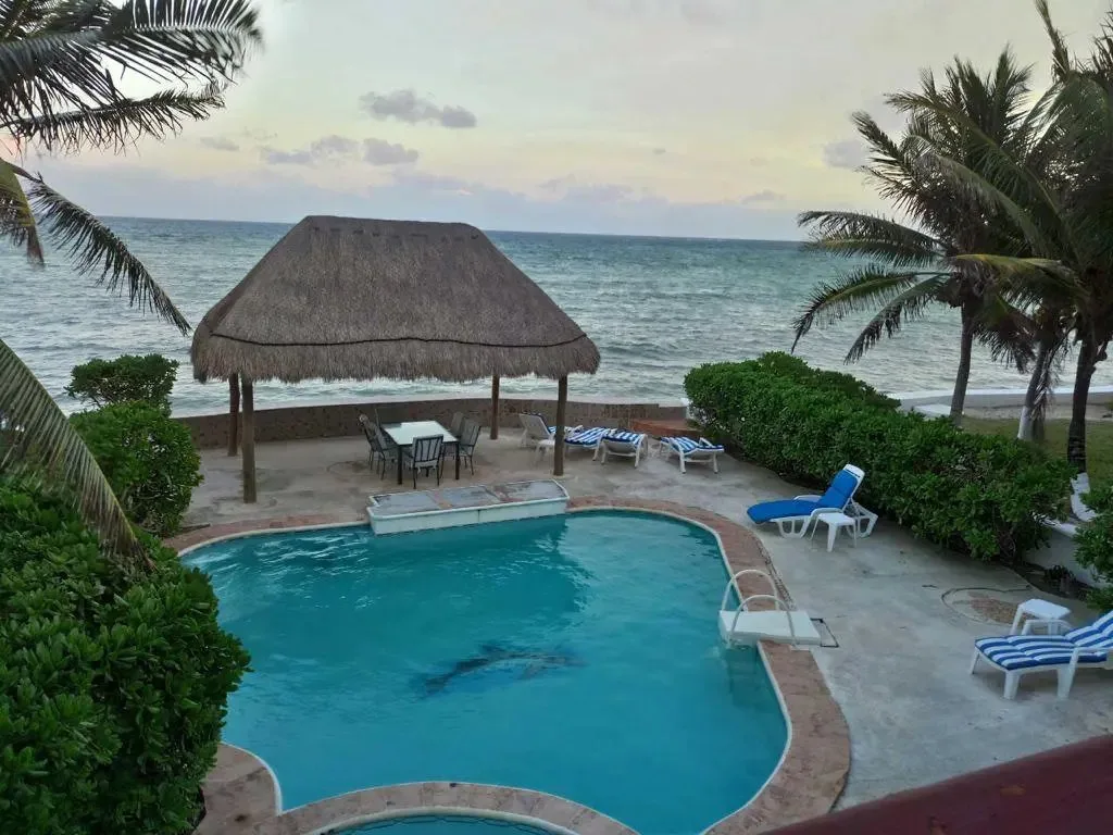 Expansive Beachfront Home with 4 Bedrooms and Outdoor Amenities in Puerto Morelos
