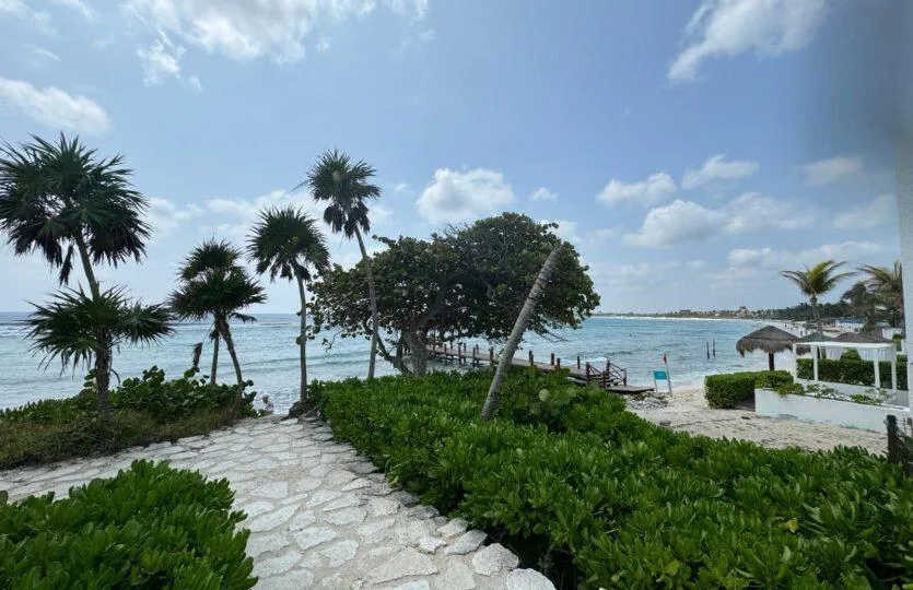 Ground-Floor Beachfront Apartment with Private Garden in Akumal's Tao Santamaria