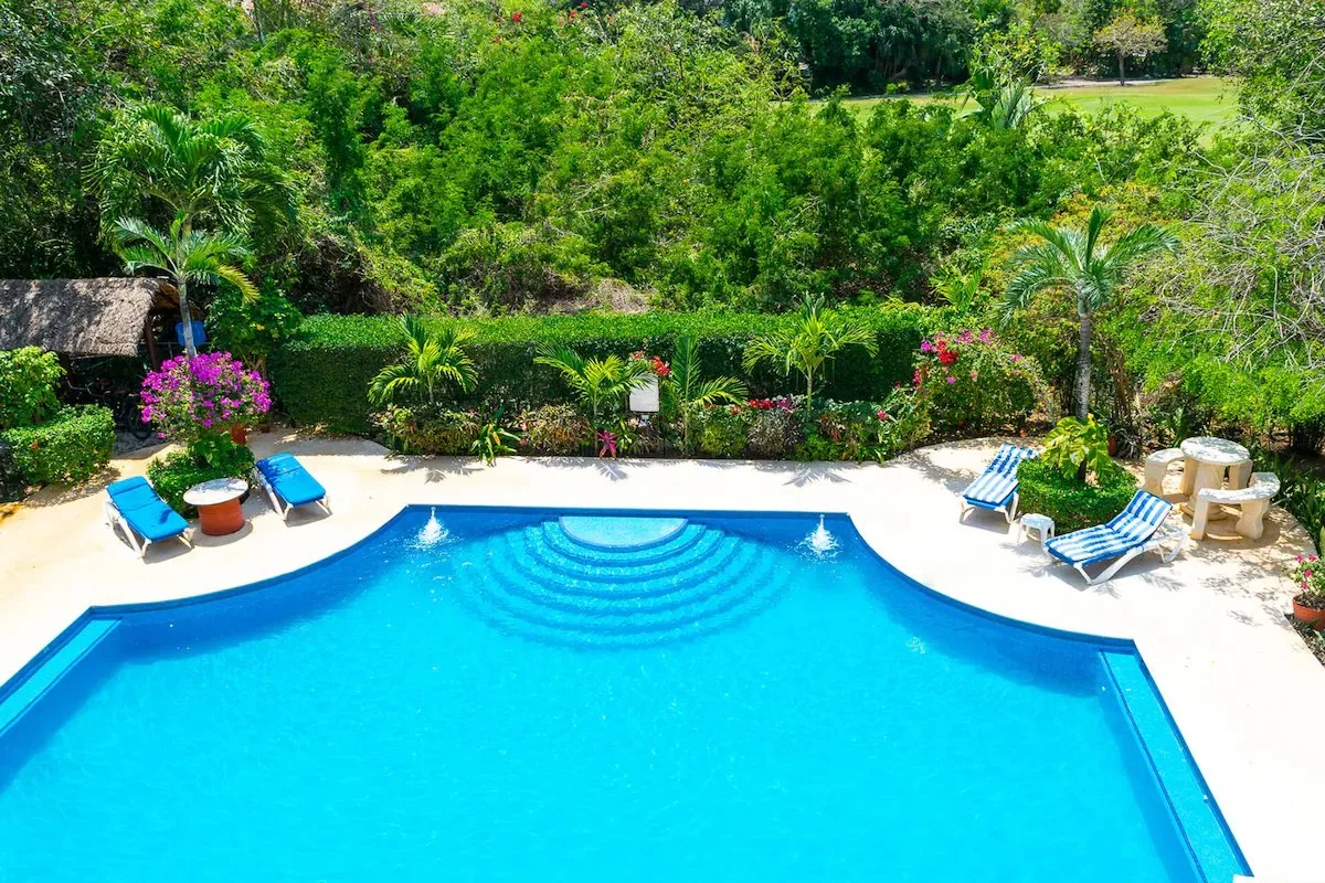 Renovated Two-Bedroom Condo in Playacar with Golf Course Views and Pool Access