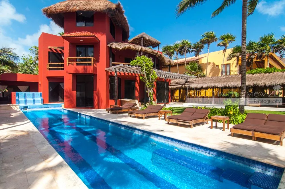 Luxury 8-Bedroom Beachfront Villa with Private Beach and Rooftop Terrace in Akumal's Jade Bay