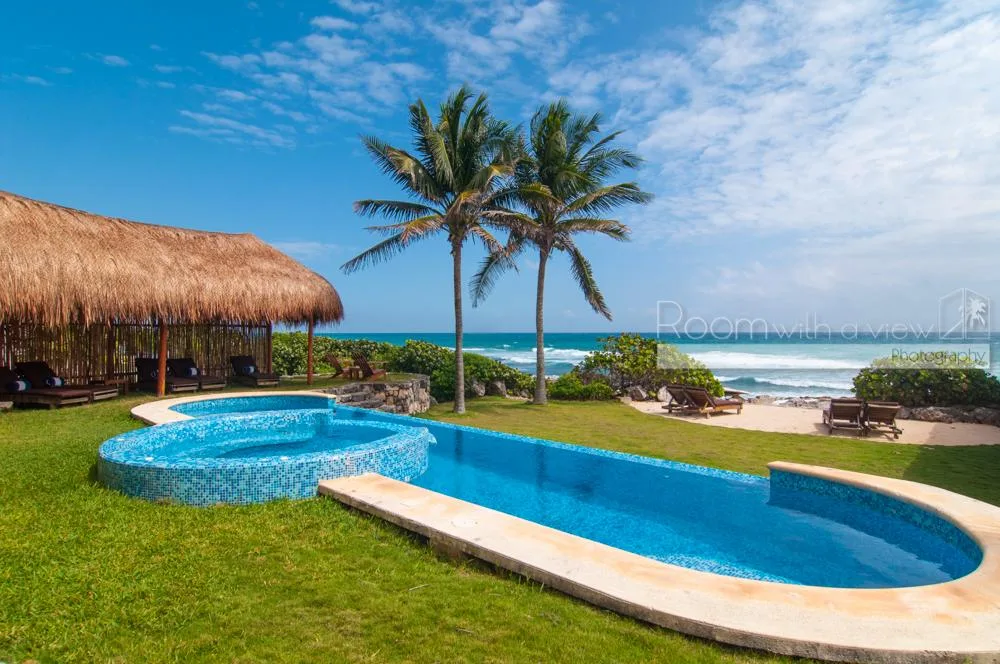 Oceanfront Villa with Nine Suites, Private Pool, and Rooftop Terrace South of Akumal