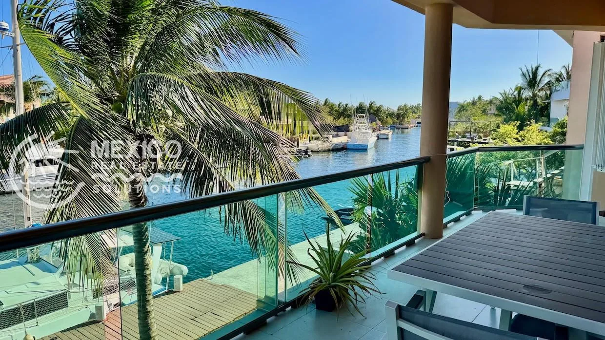 Two-Bedroom Marina-View Condo with Private Dock in Puerto Aventuras