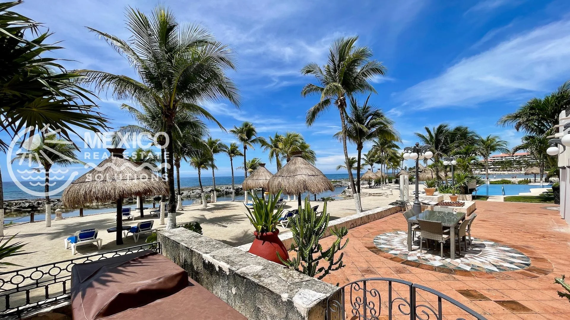 Spacious 3-Bedroom Beachfront Condo with Direct Beach Access and Private Terrace in Puerto Aventuras
