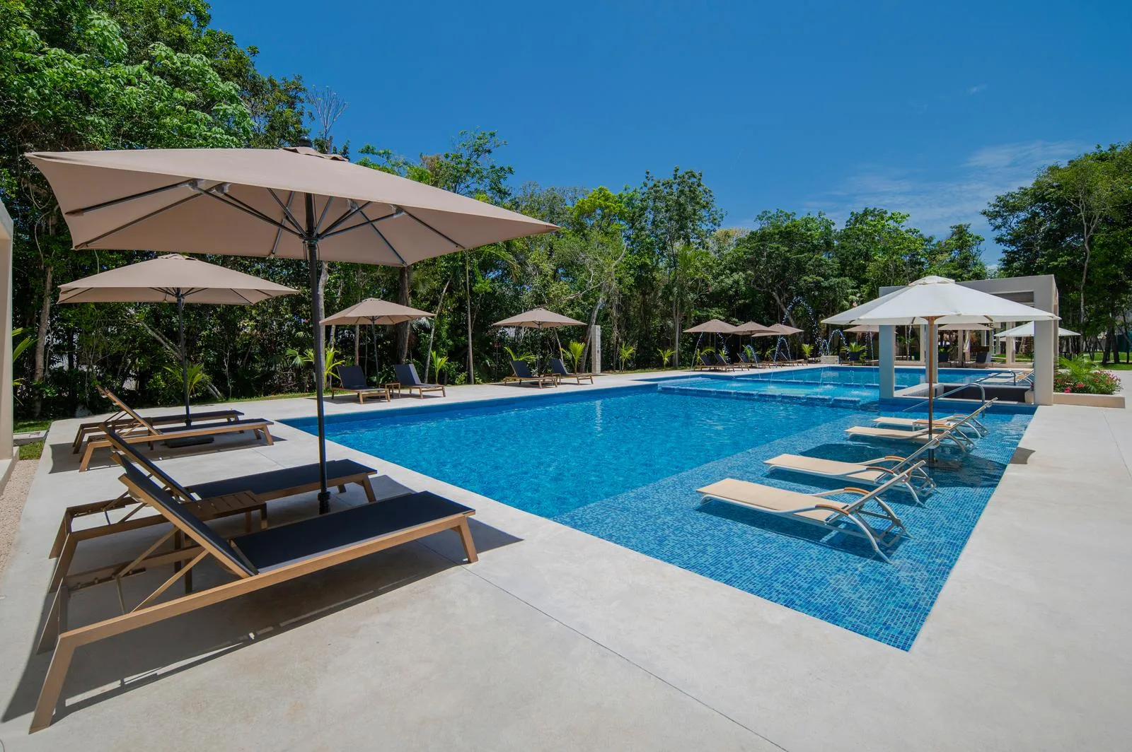 2-Bedroom Apartment in Puerto Morelos with Resort Amenities and Caribbean Sea Access