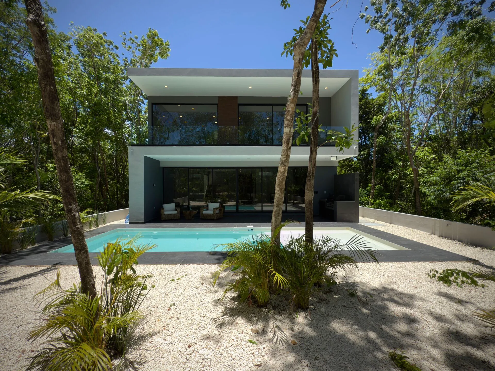 Modern Four-Bedroom Villa with Private Beach Club Access in Xpu-Ha