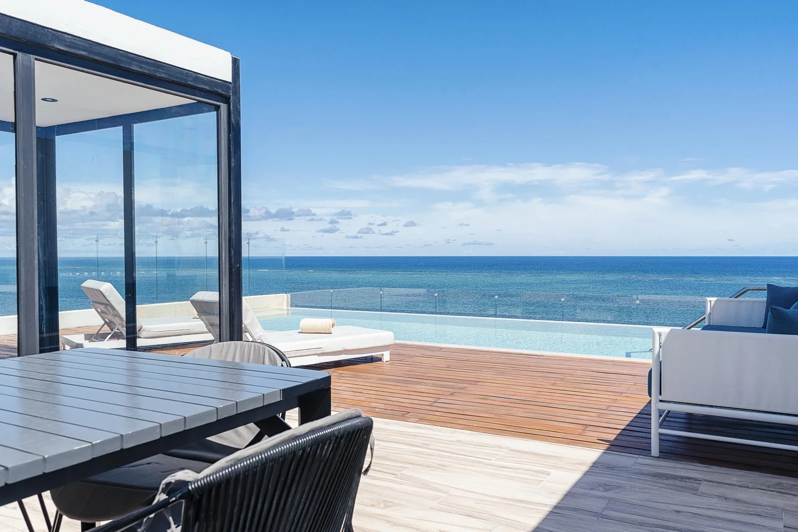 Beachfront Puerto Morelos Penthouse with Private Rooftop Jacuzzi and One Bedroom