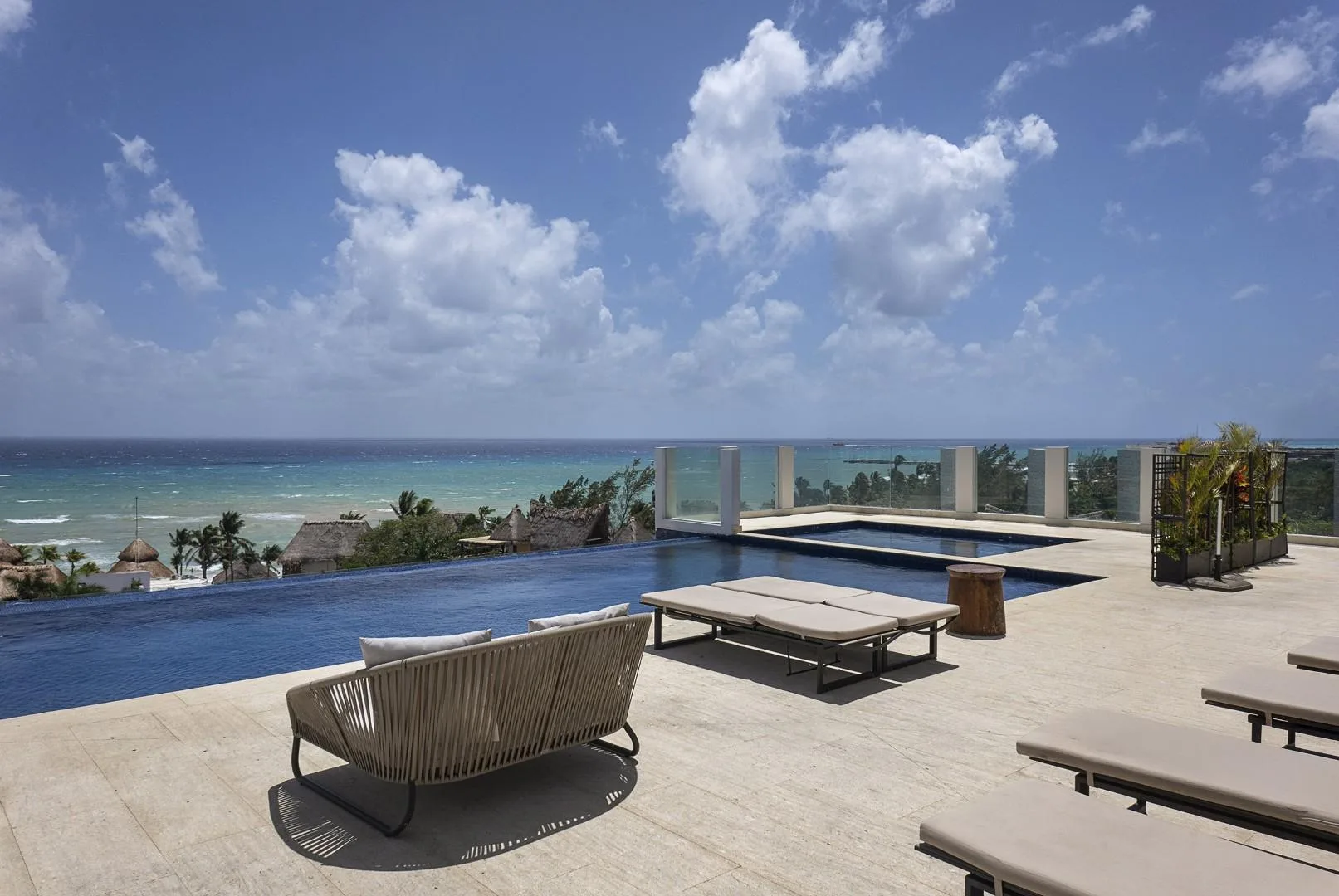Bi-Level Three-Bedroom Penthouse with Panoramic Caribbean Views in Playa del Carmen's Golden Zone