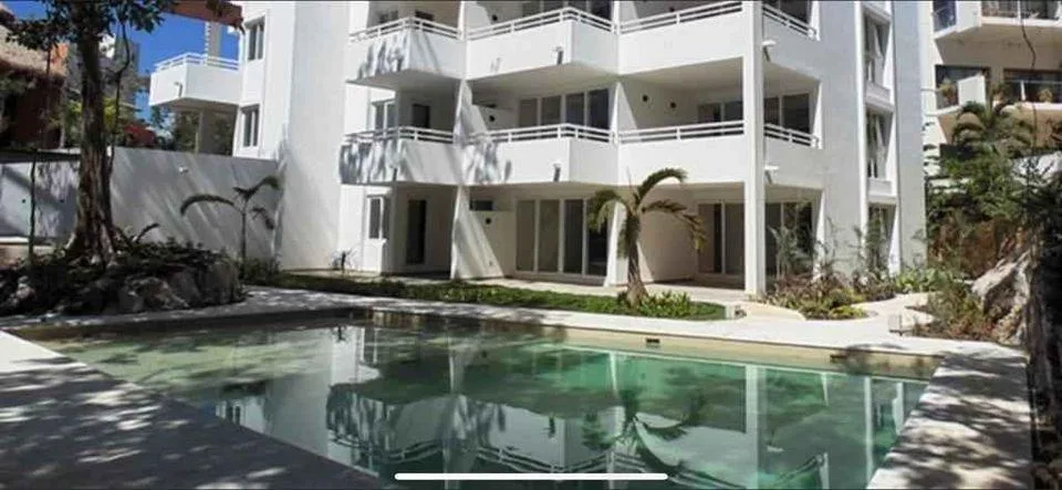 Two-Bedroom Lock-Off Apartment with Private Terrace in Akumal's Grand Sirenis Complex
