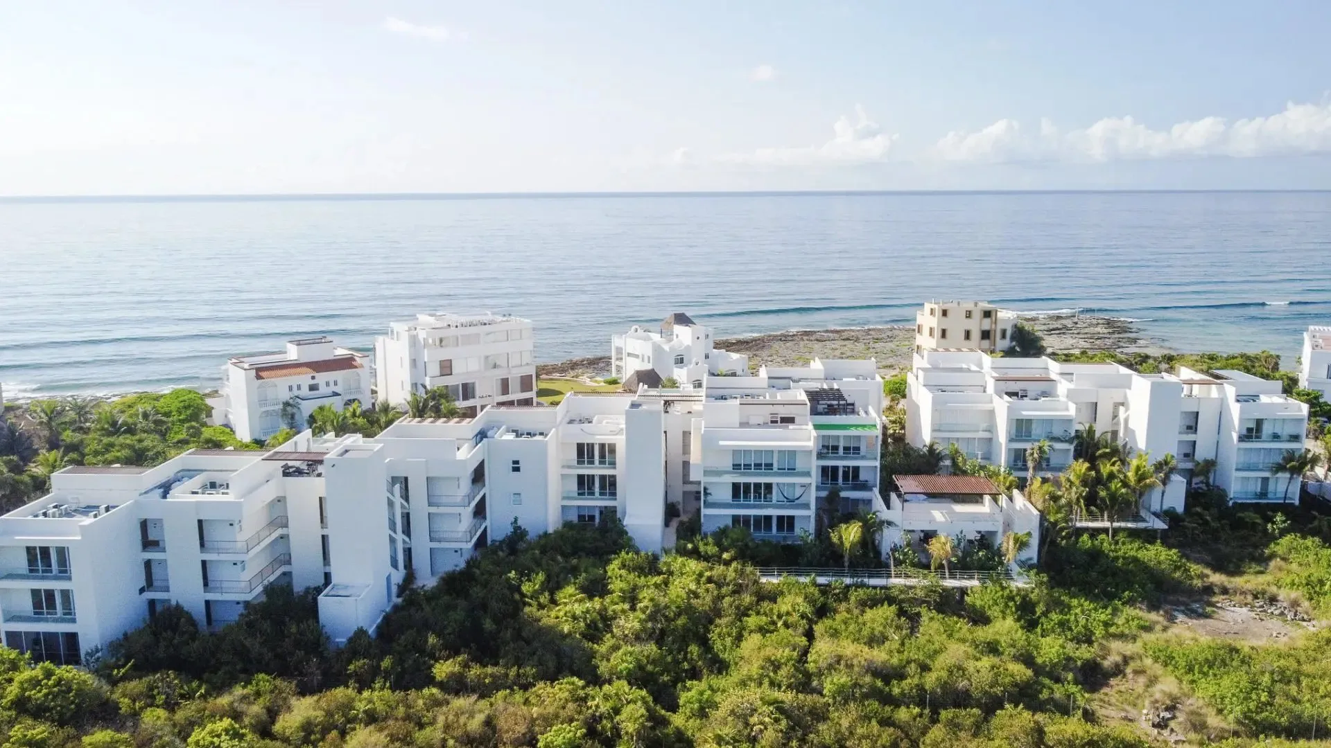 Exclusive Beachfront Apartments in Akumal with Ocean Views and Direct Beach Access