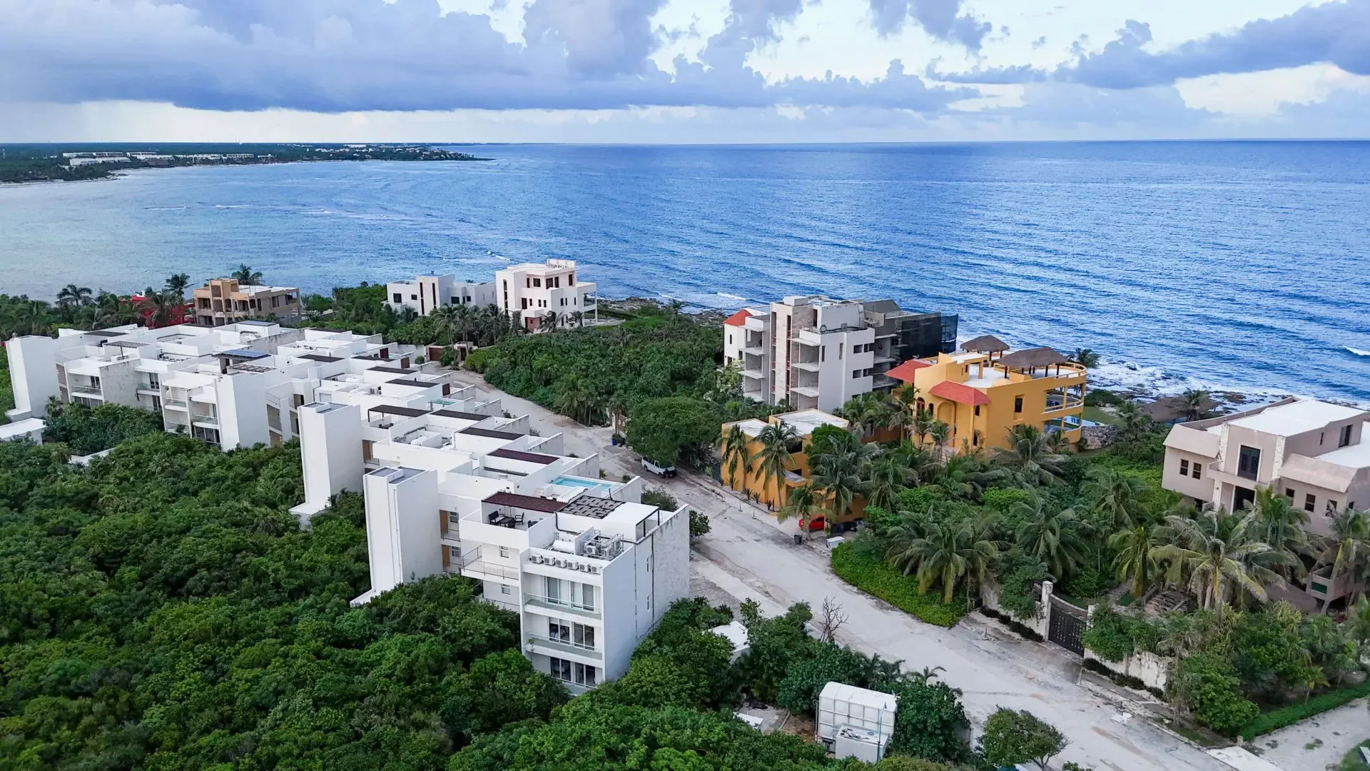 Two-Bedroom Condo with Garden View, Lock-Off Layout, and Rooftop Pools in Punta Sur Akumal