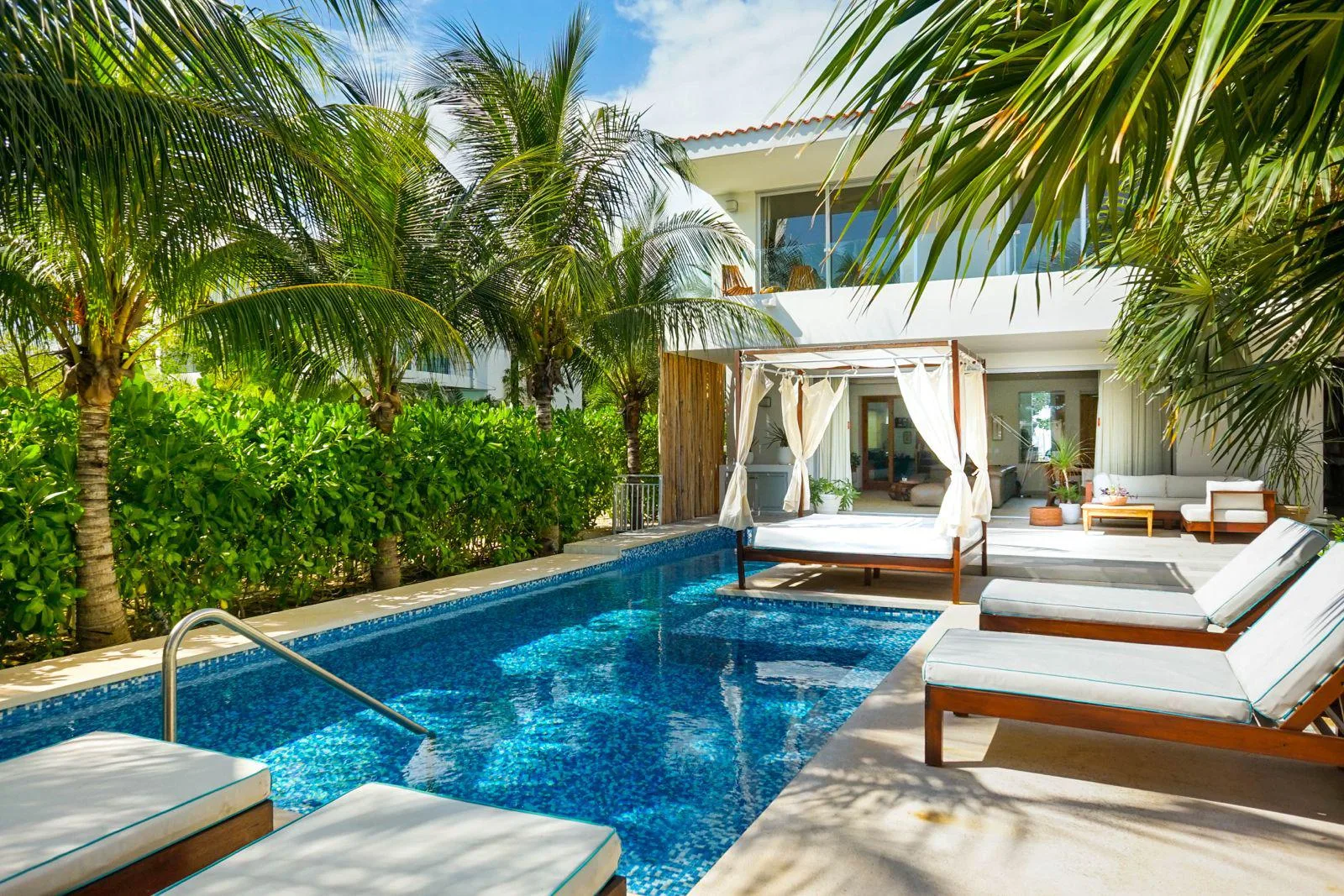 Canal-Front Residence with 4 Bedrooms, Private Dock, and Expansive Living Space