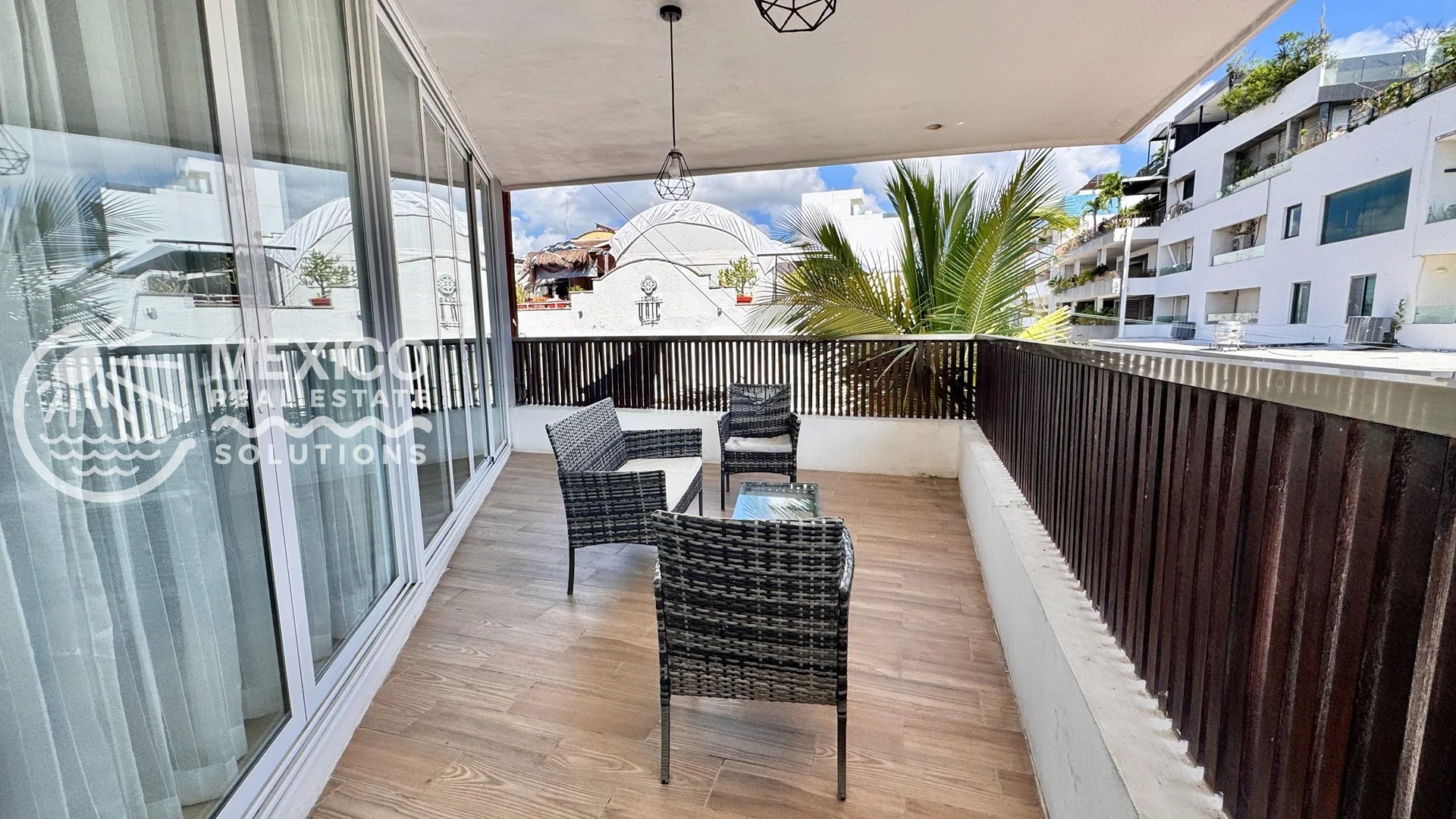 2-Bedroom Condo with Corner Terrace and Rooftop Pool on Playa del Carmen's 5th Avenue