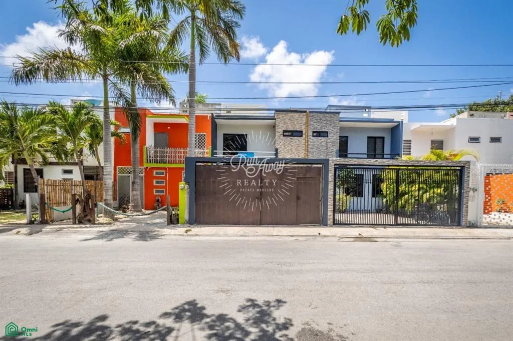 Three-Bedroom Home in Puerto Morelos with Backyard Patio, Secure Garage, and Near Beach