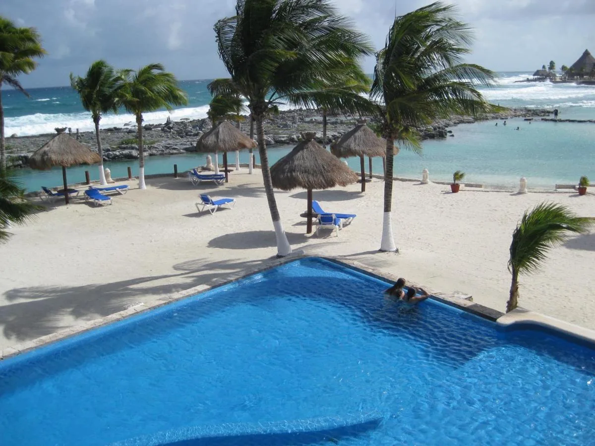 Beachfront Two-Bedroom Condo with Private Lagoon Access in Puerto Aventuras