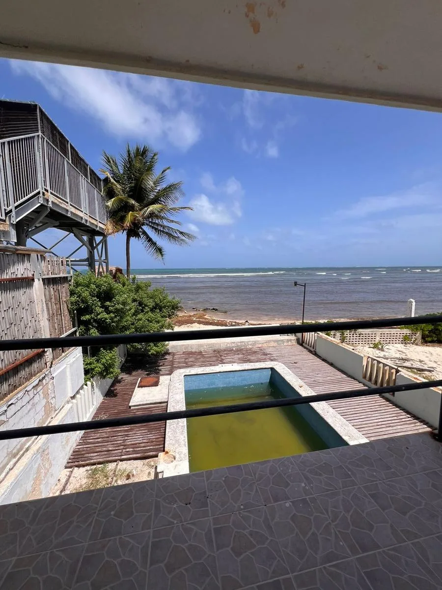 Luxury Four-Bedroom House with Sea Views, Pool, and Direct Beach Access in Puerto Morelos