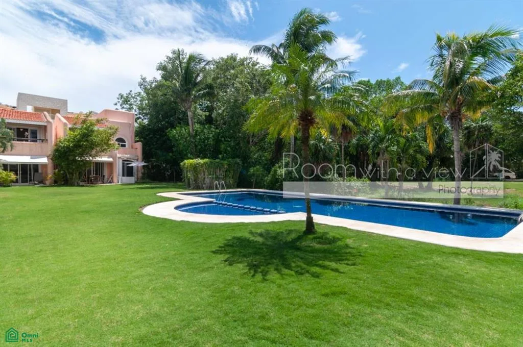 Updated 3-Bedroom Townhome with Golf Course Views in Puerto Aventuras Gated Community