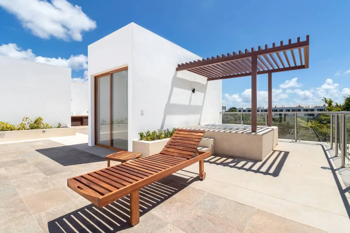 Luxury Two-Bedroom Penthouse with Private Rooftop Jacuzzi in Akumal's Tulum Country Club