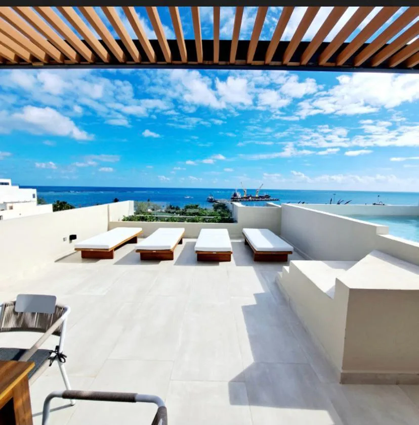 2-Bedroom Penthouse with Double-Height Ceilings and Rooftop Pool in Puerto Morelos