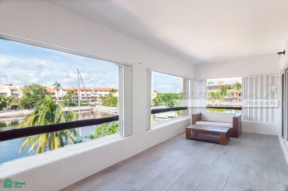 Fully Renovated 2-Bedroom Condo with Marina View and Large Terrace in Puerto Aventuras