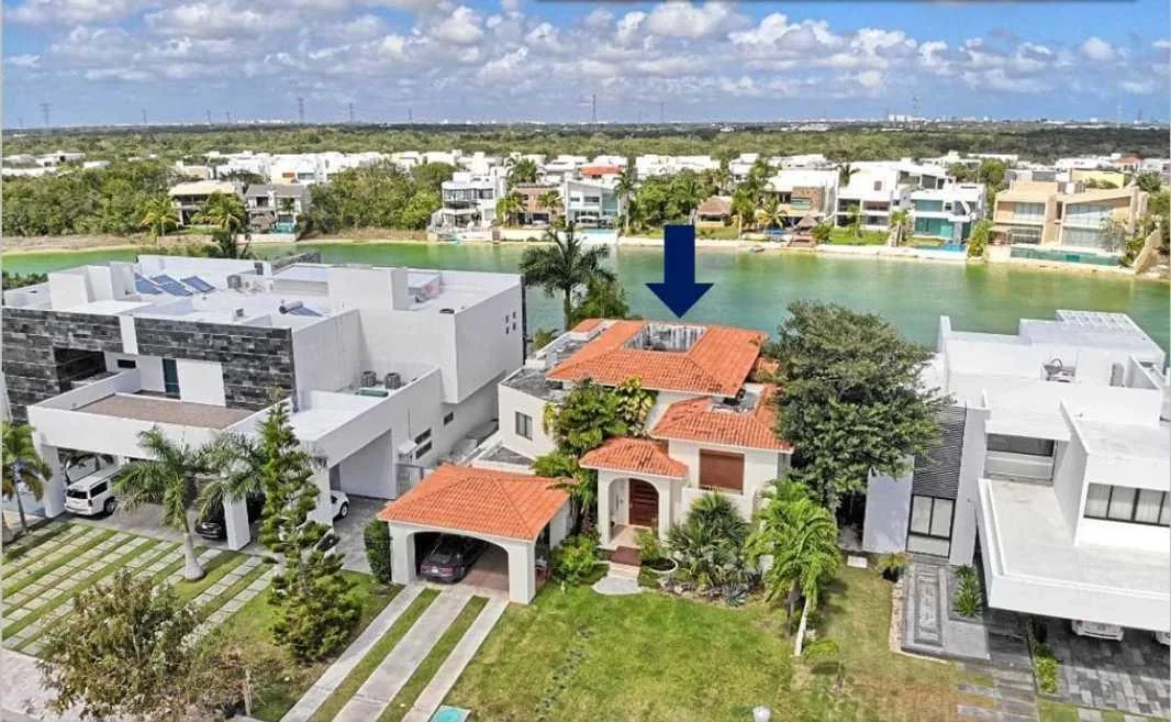 Luxury Four-Bedroom Residence with Infinity Pool in Lakefront Community