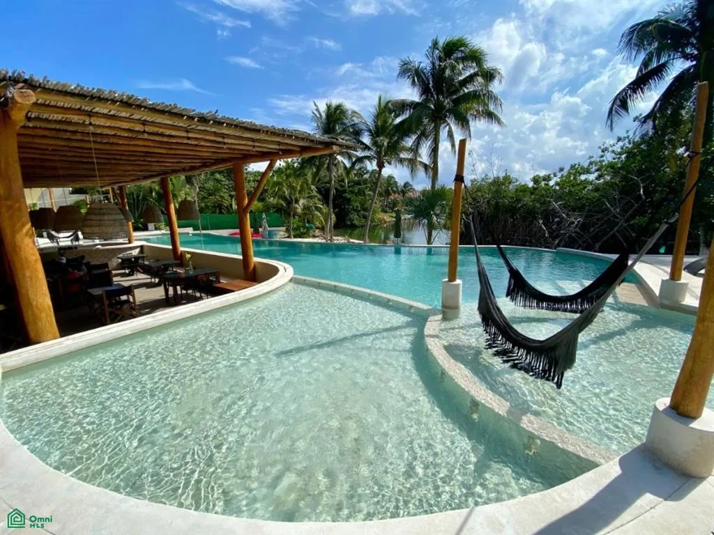 Luxury Waterfront Residences in Private Puerto Aventuras with Lagoon Access