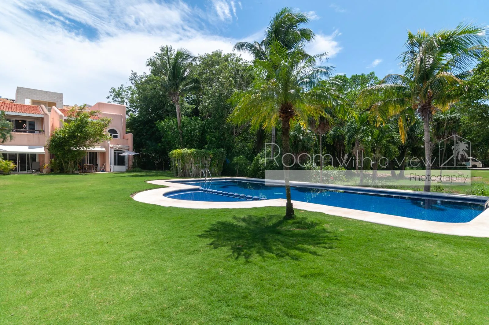 Updated Three-Bedroom Stand-Alone Townhome Next to Golf Course in Puerto Aventuras