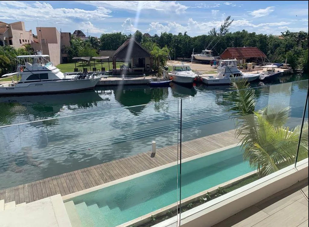 Townhome with 2 Bedrooms, Pool Access, and Dock in Puerto Aventuras