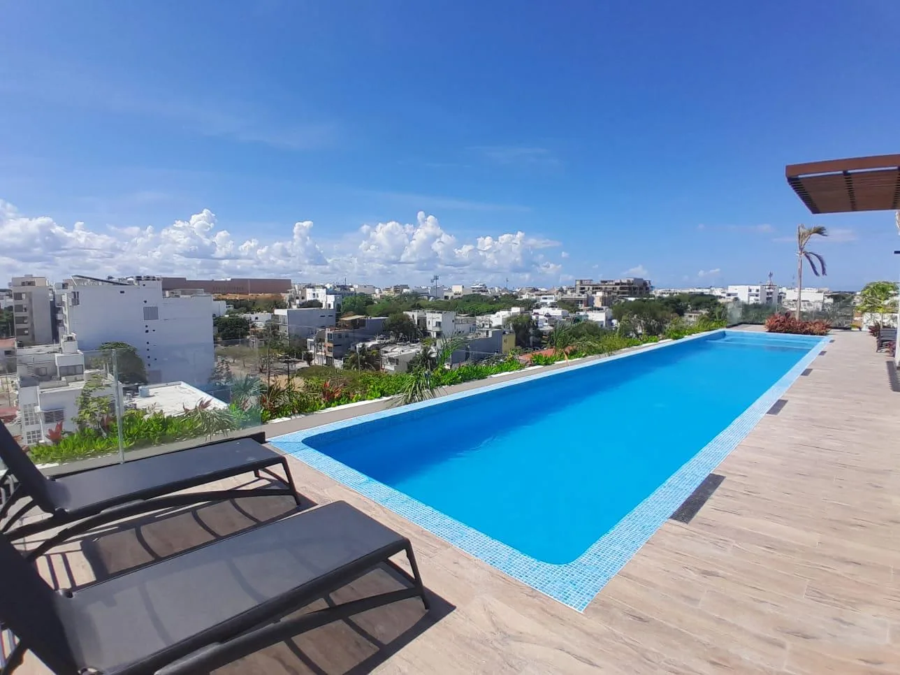 Modern Apartments in Playa del Carmen with Rooftop Pool and Beach Club Access