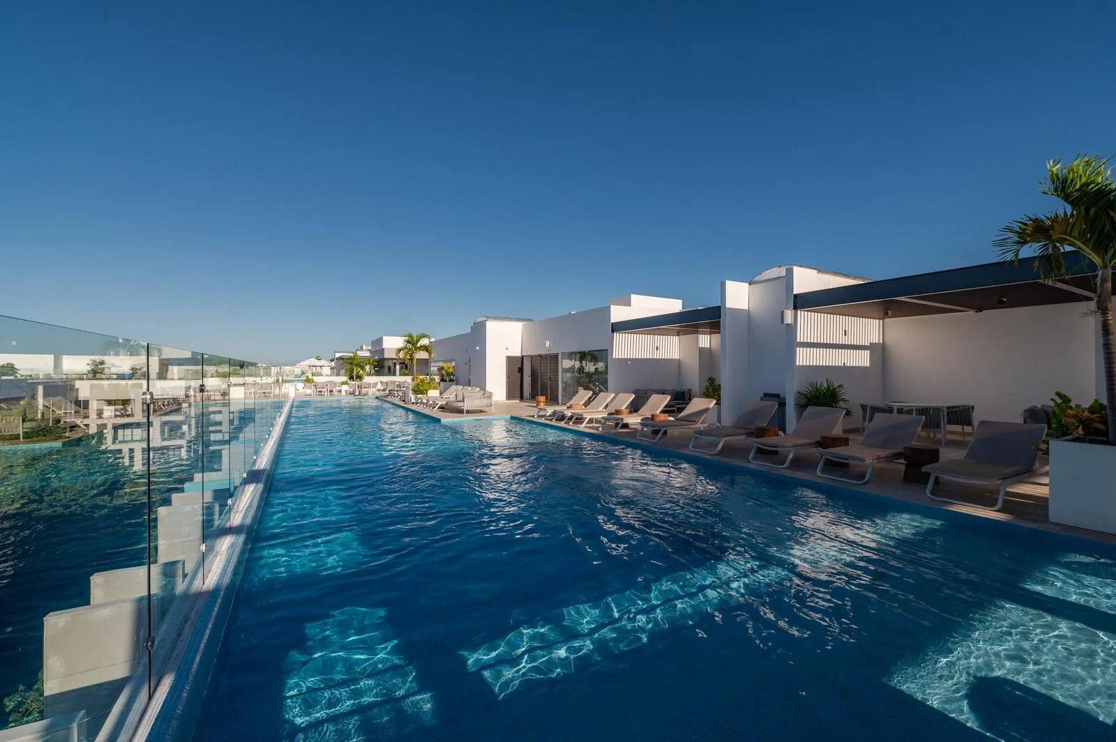 Contemporary Residential Development in Playa del Carmen with Pool, Sky Bar, and Prime Walkable Location