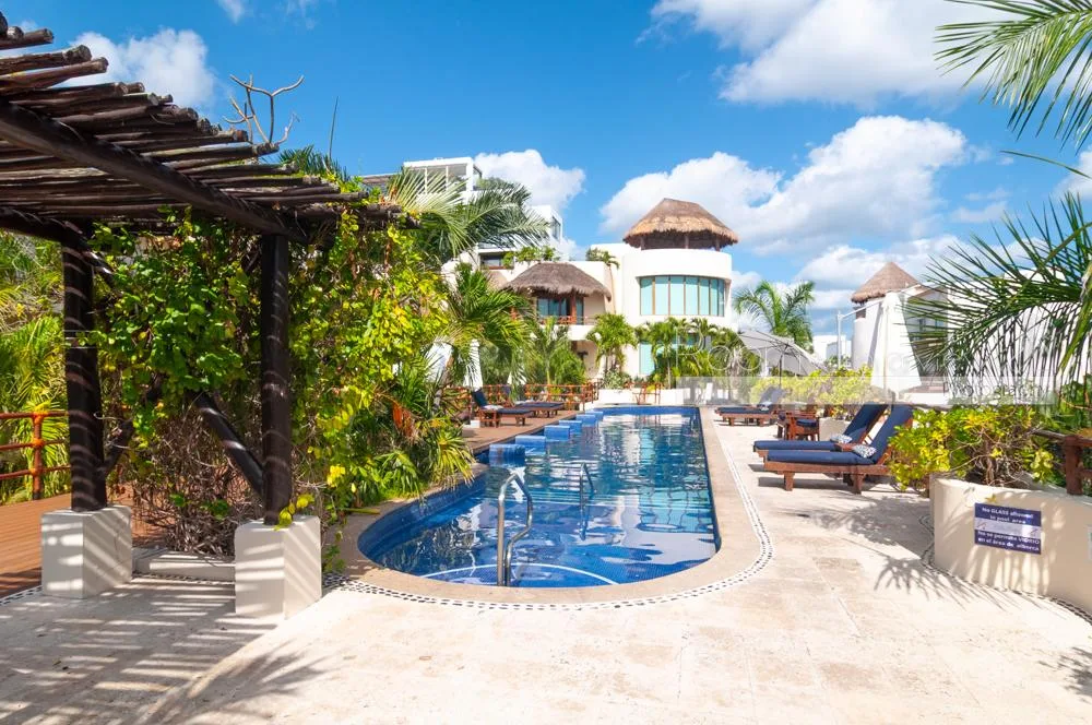 Two-Bedroom Garden-Level Condo with Pools and Beach Proximity in Downtown Playa del Carmen