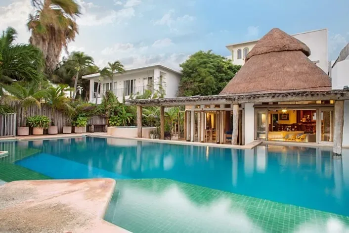 Lagoon Front Luxury Home with 7+ Bedrooms, Pool, and Dock in Cancun