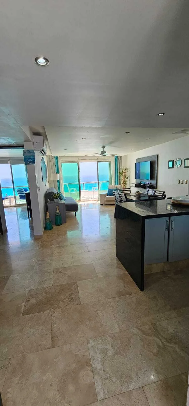Two-Story Oceanfront Apartment with 3 Bedrooms, Panoramic Views, and Two Terraces