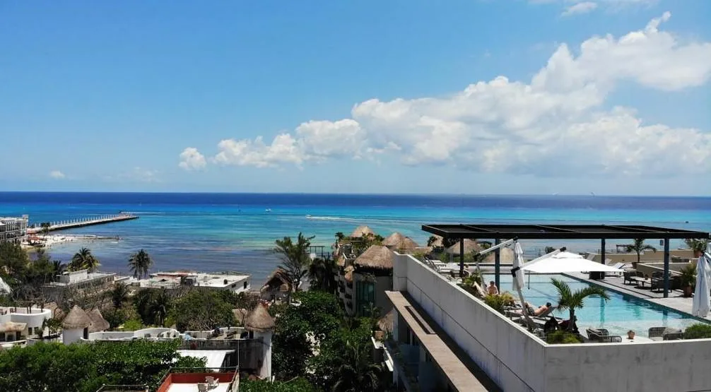 Turnkey Modern Multi-Level Building with Rooftop Pool in Riviera Maya