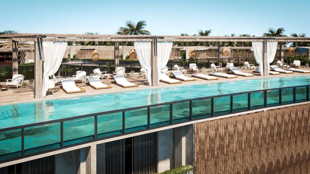 Bohemian-Style Studio Apartments in Aldea Zama with Rooftop Infinity Pool and Cinema