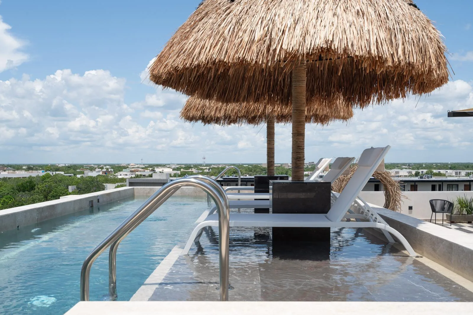 Circular Architectural Design with Pool and Rooftop Amenities in Aldea Zamá, Tulum