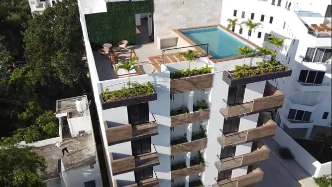 Modern One-Bedroom Apartments in Playa del Carmen's Zona Diamante with Roof Garden and Sky Bar