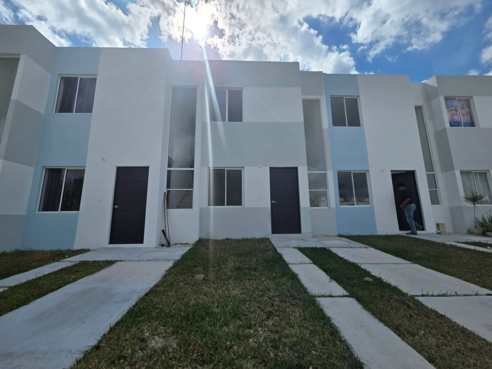 Two-Story Cancún Home with Three Bedrooms, Granite Kitchen, and Private Garden