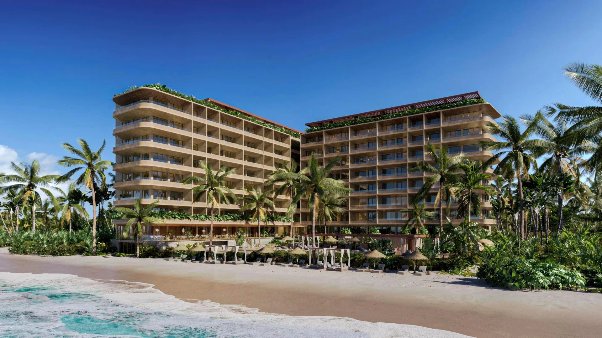 Beachfront Residences in Puerto Morelos with Luxury Amenities and Hotel Services