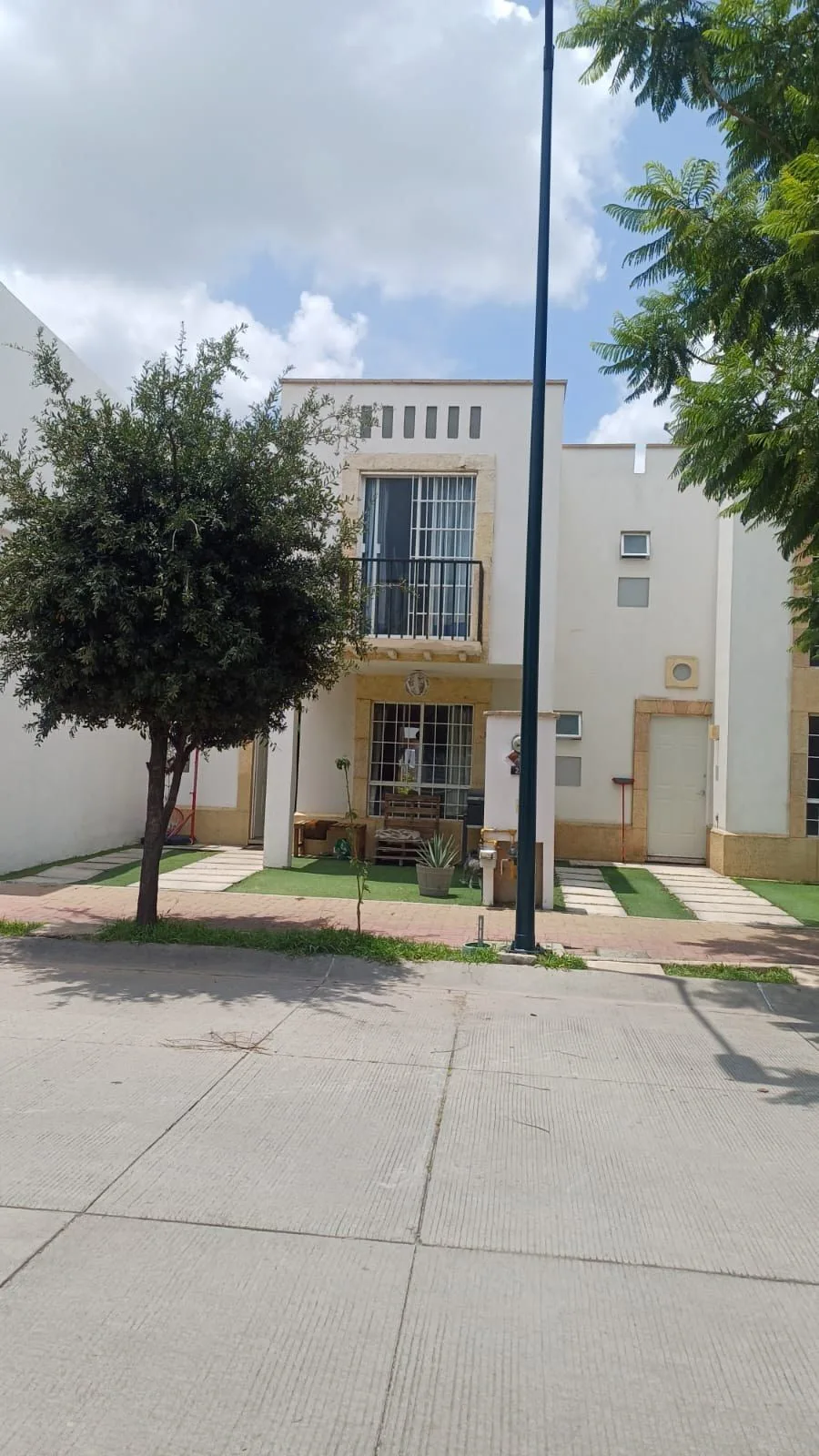 Spacious Three-Bedroom Home with Expanded Kitchen in Gated Community